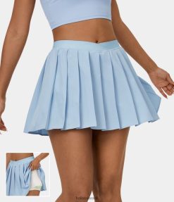 Halara נשים חצאית מיני טניס עם קפלים בכיס 2 ב-1 עם מותן גבוה XX0PF613 בגדים פעילים אומפלודות