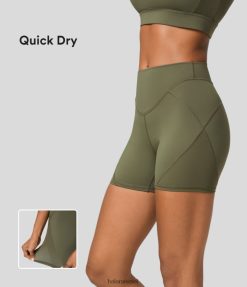 Halara נשים מכנסי אימון אופנוענים מהירים יבשים עם תפירה עליונה בגובה בינוני 4 אינץ' XX0PF1424 בגדים פעילים דשא אפור ירוק
