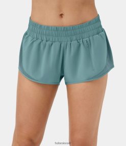 Halara נשים מכנסי ריצה קצרים מתייבשים במהירות 2.5 אינץ' 2-in-1 עם רוכסן שרוך ונעים. XX0PF1276 בגדים פעילים כחול מינרלי