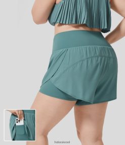 Halara נשים מכפלת מעוקלת סופר-גבוהה בצורת כיס צד 2 ב-1 מהיר יבש יוגה מכנסיים קצרים בגודל 4 אינץ' XX0PF2131 תחתונים כחול מינרלי