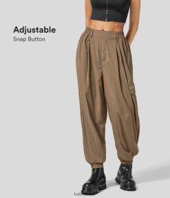 Halara נשים עמיד למים רצועת מותניים אלסטית באמצע עלייה מרובת כיסים מתכווננת מכפלת כפתור לחיצה מזדמנת XX0PF30 הַלבָּשָׁה לוּטרָה